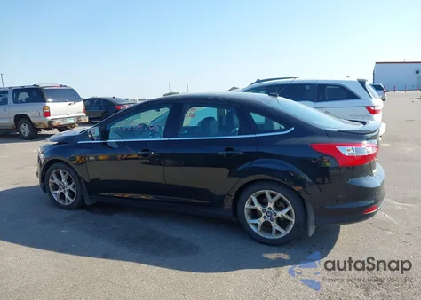 2014 Ford Focus Titanium from USA, damaged, VIN 1FADP3J23EL237429